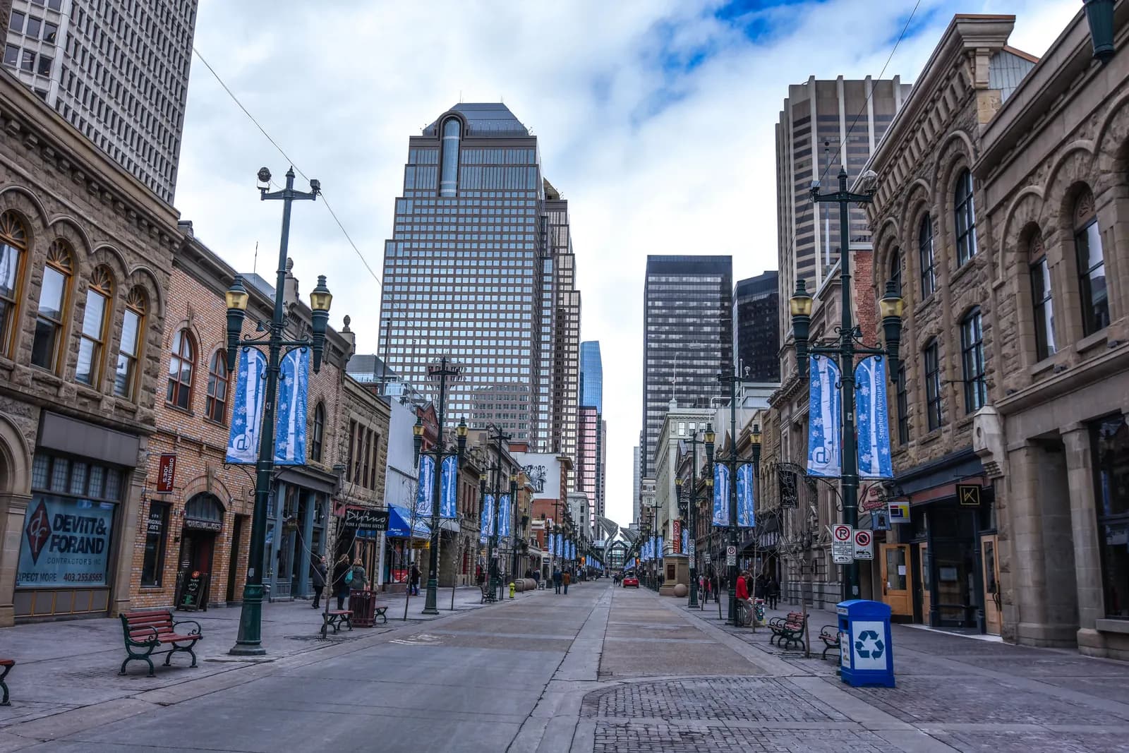 Stephen Avenue pedestrian mall in downtown Calgary lined with sandstone shopfronts and office towers