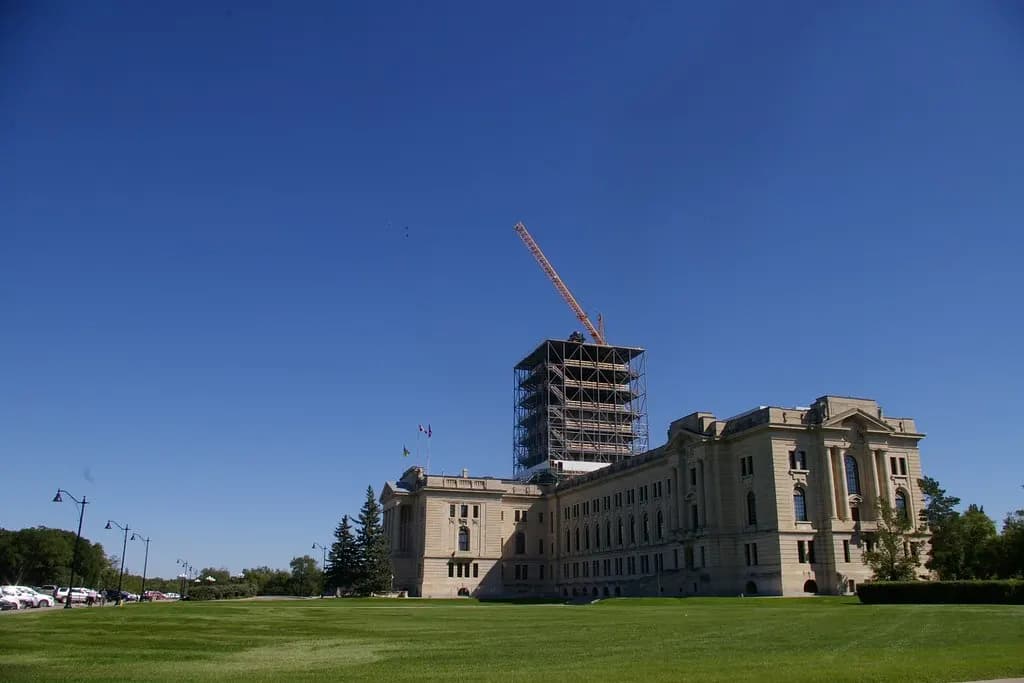 The domed Saskatchewan Legislative Building in Regina seen across its lawns