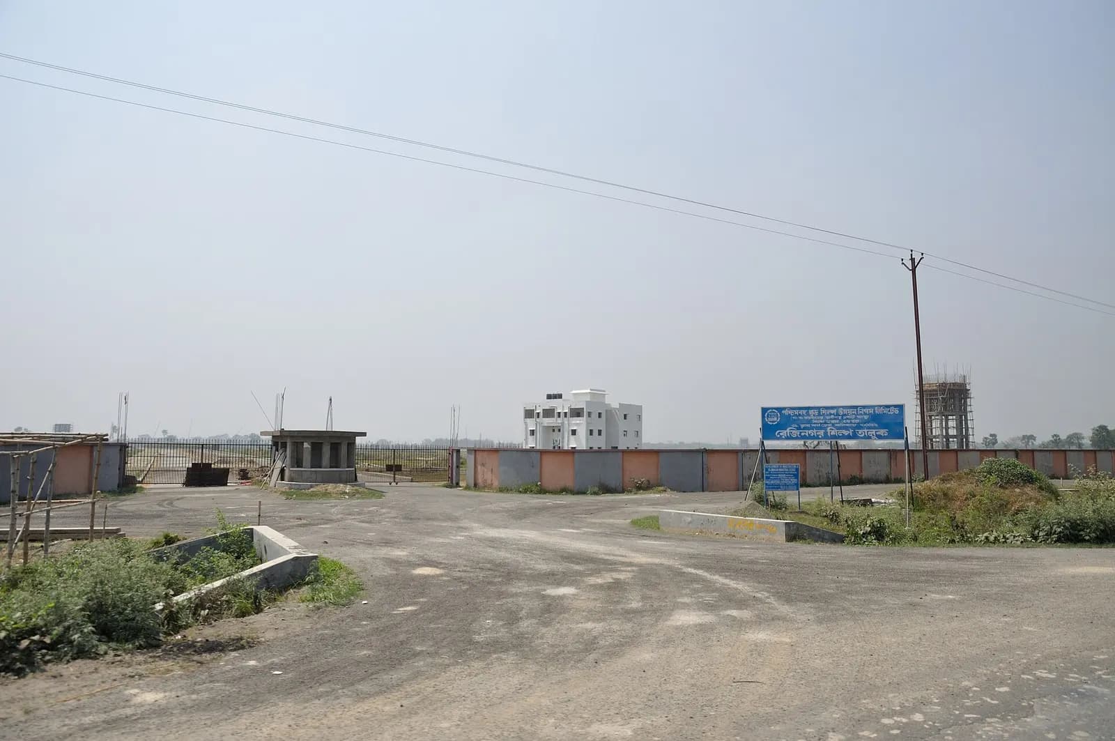Entrance road to the Rejinagar Industrial Estate beside National Highway 34 in Murshidabad, West Bengal