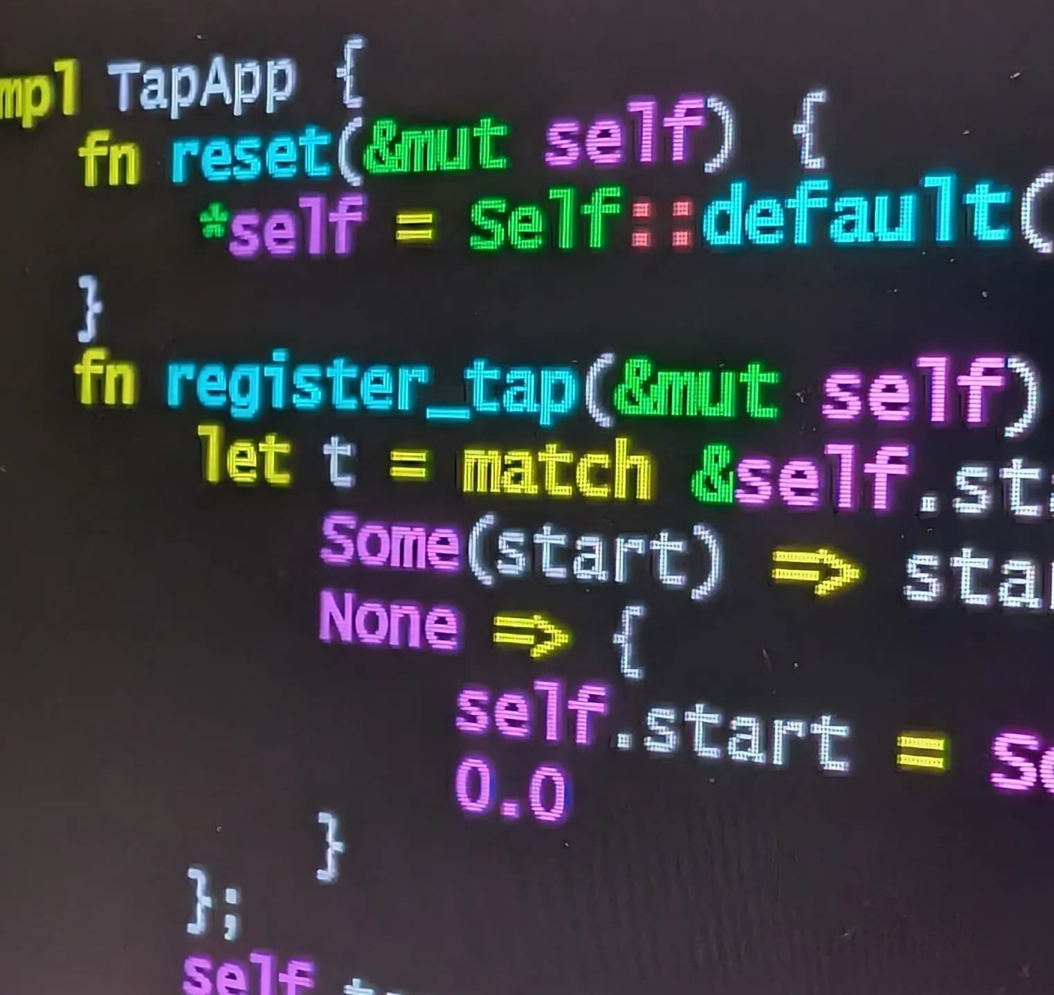 Source code displayed in a colourful text editor on a computer screen