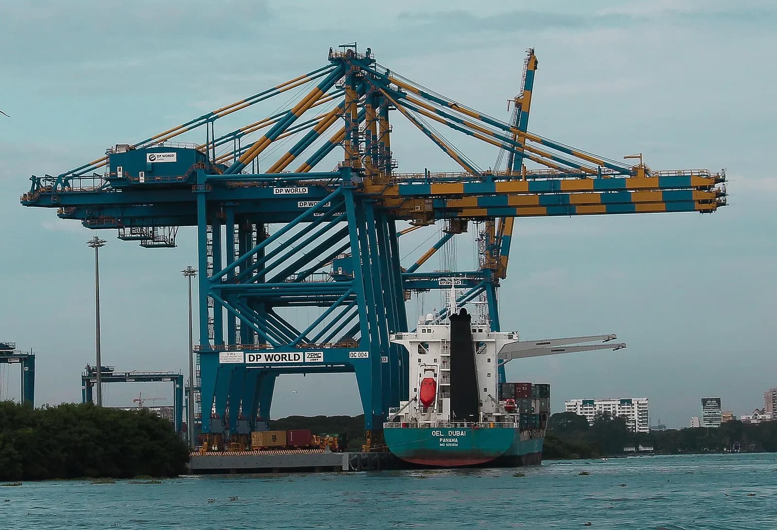 A container crane loading a feeder ship at the International Container Transhipment Terminal, Vallarpadam, Kochi