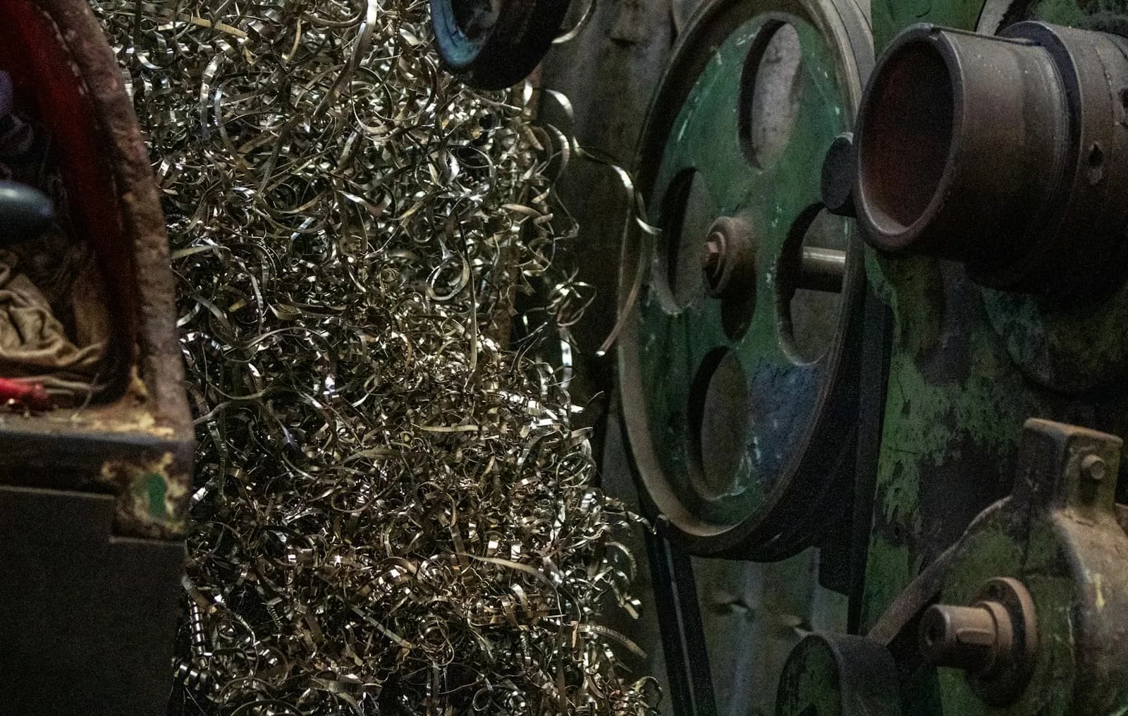 Industrial machinery with metal shavings in an Indian workshop