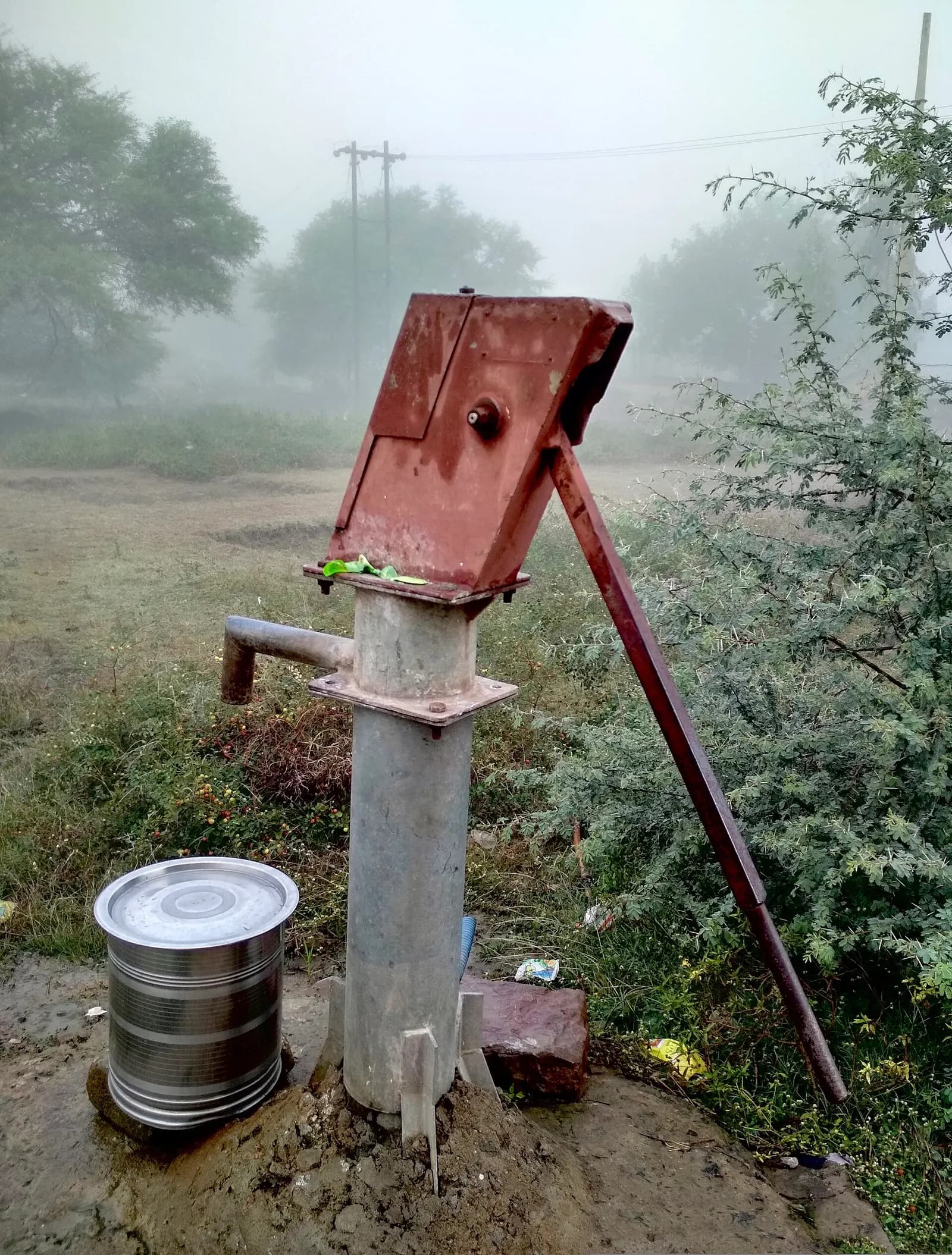 A village handpump on a misty morning in Bohardih, Bilaspur district, Chhattisgarh