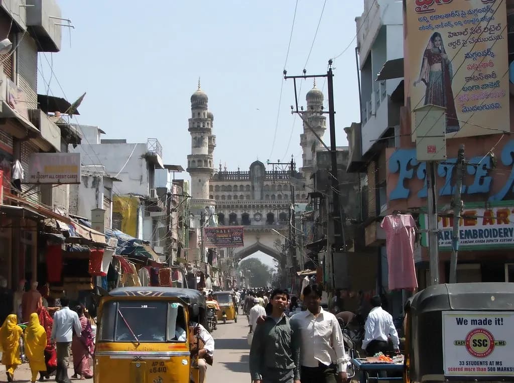 Shops along Laad Bazaar with the Charminar at the end of the street in Hyderabad