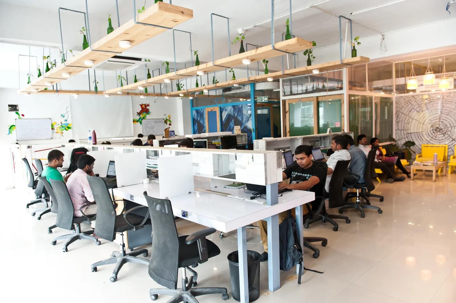 Founders working at long desks in a coworking space in HSR Layout, Bengaluru