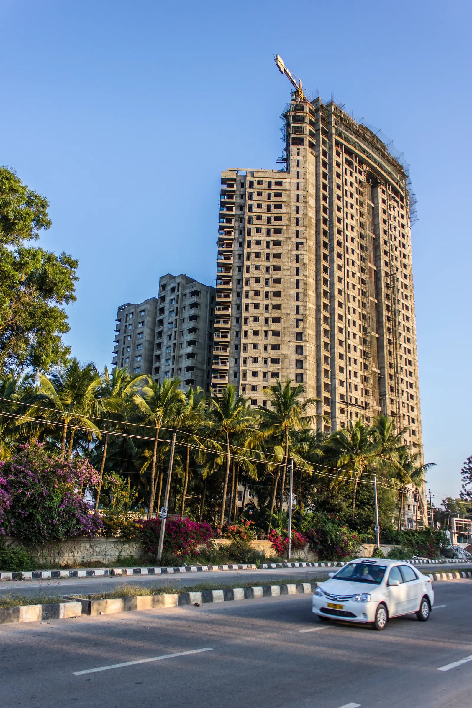 A high-rise residential tower under construction in Bengaluru