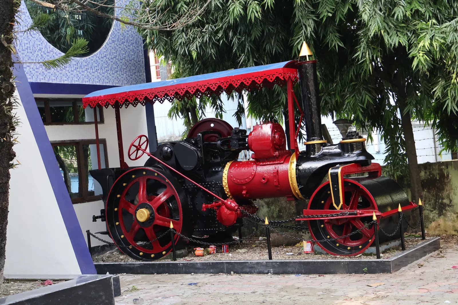 A restored vintage steam road roller displayed outside the Public Works Department office in Cooch Behar, West Bengal
