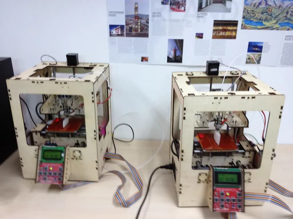 A row of desktop 3D printers used for prototyping new products