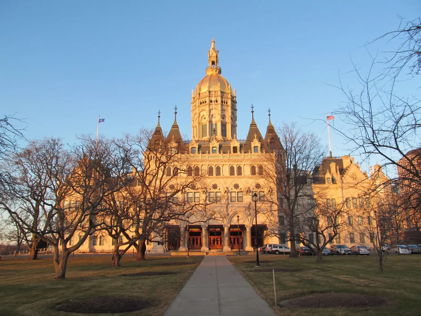 The gold-domed Connecticut State Capitol in Hartford seen across Bushnell Park