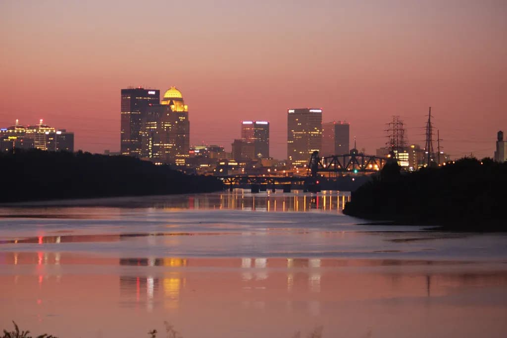 The Louisville, Kentucky skyline reflected in the Ohio River at dawn
