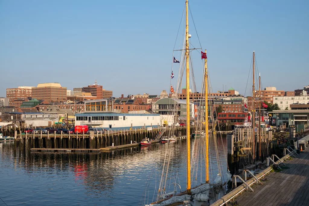 Wharves and tall ships on the Portland, Maine waterfront beside the Old Port district