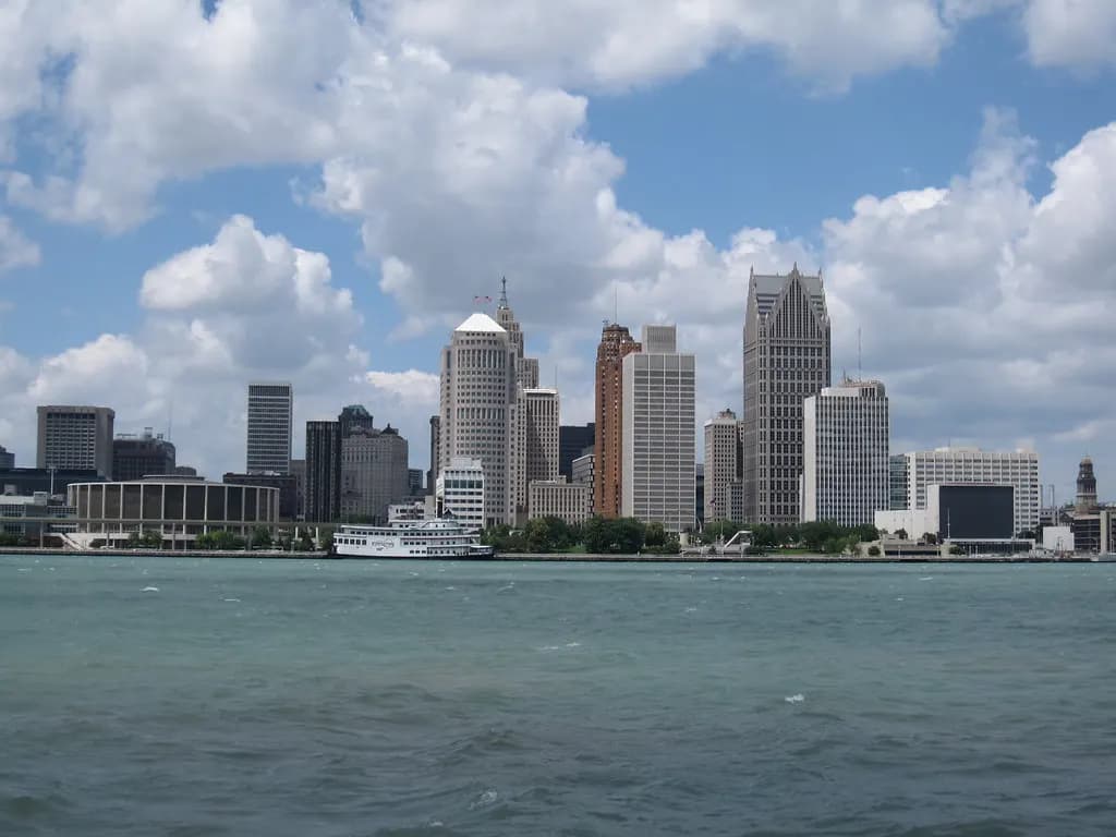 The downtown Detroit skyline seen across the Detroit River on a summer day