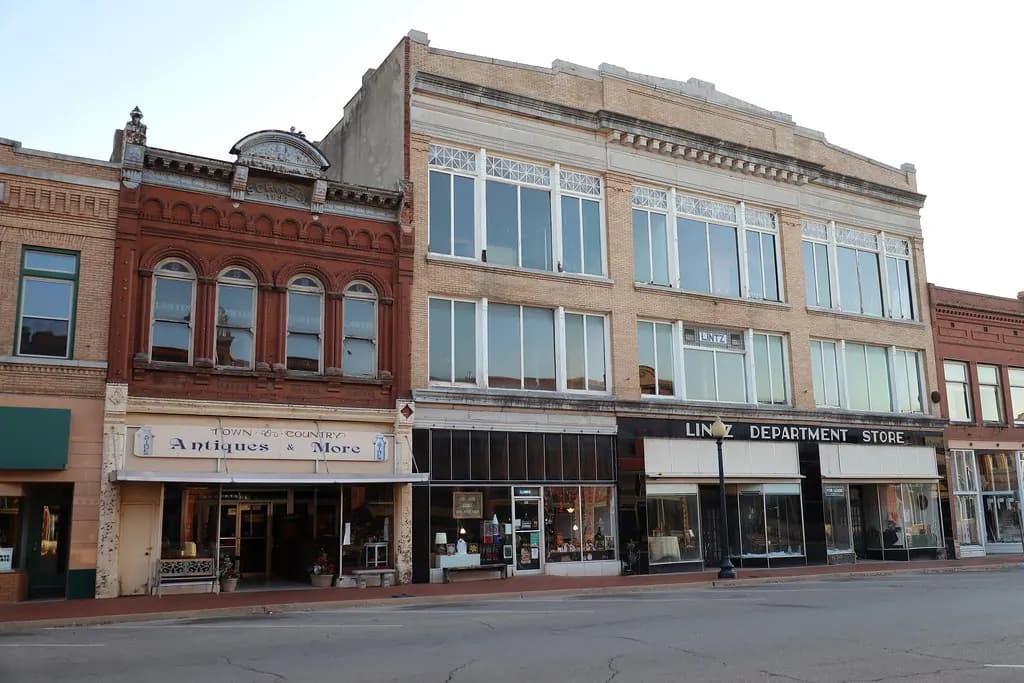 The Schnell Building and the former Lintz Department Store on a commercial street in Guthrie, Oklahoma