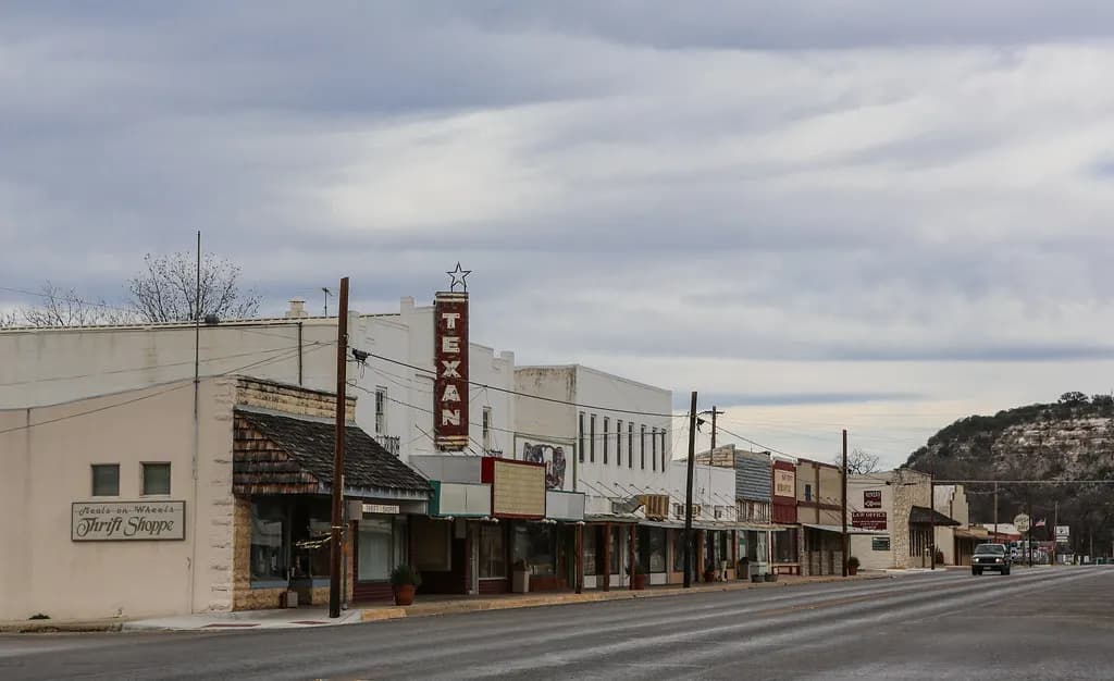 Row of small shop fronts on Main Street in Junction, Texas